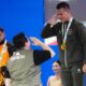 Lifter Rizki Juniansyah kembali mempersembahkan medali emas dan pecahkan rekor terwujud saat turun di kelas 79 kg putra SEA Games 2025 Thailand.(Sumber Foto: Fajar/kemenpora.go.id)